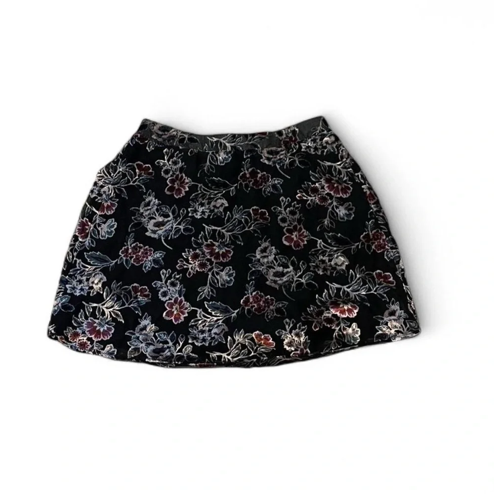 American Eagle Coquette black velvety mini skirt, size XS. Floral design.